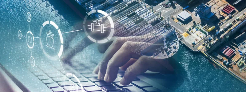 Shipyard, hand working on keyboard and digital icons