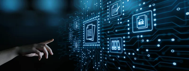Hand pointing at digital icons and an electrical diagram