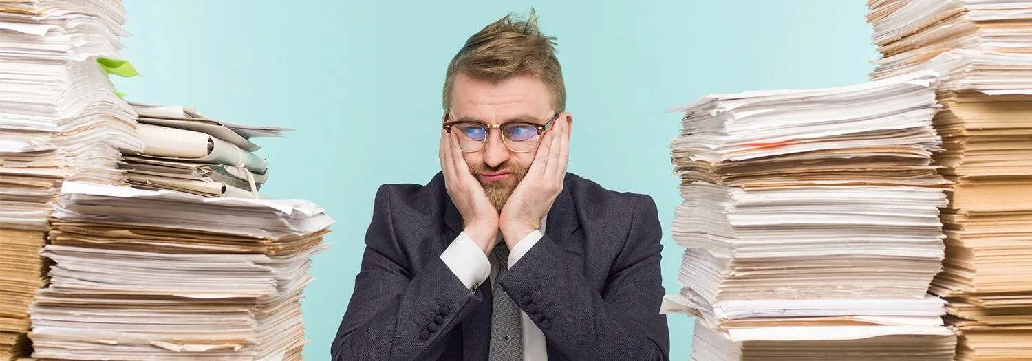 Engineer with a lot of paperwork