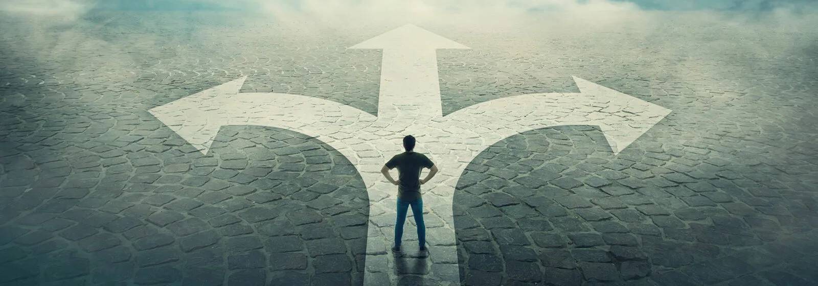 A man standing Infront of 3 arrows to each direction