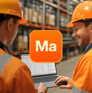 Two men wearing a safety helmets in a pipe storage area. They look at a laptop showing material and piping management software.