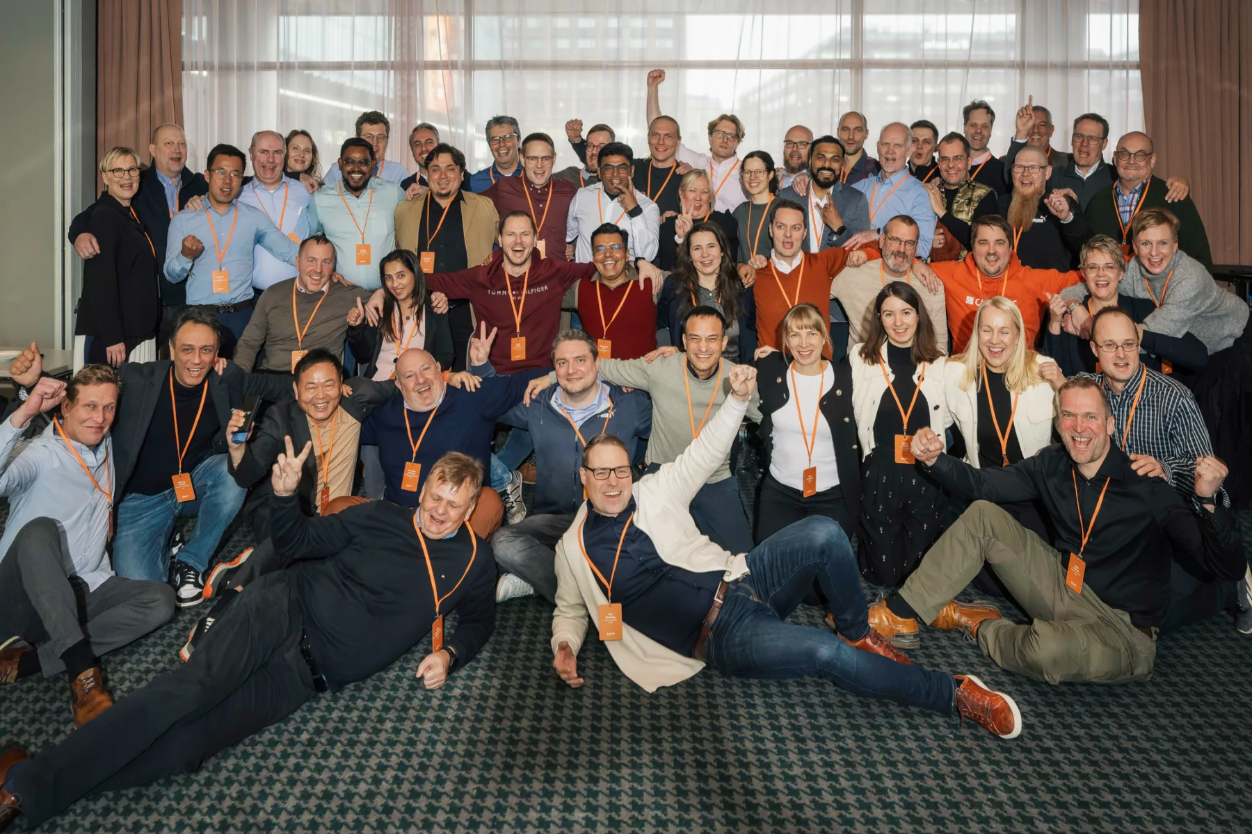 Cadmatic team celebrating succeeding together