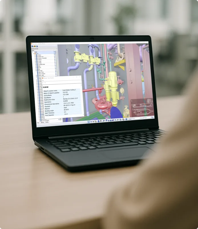 Laptop with the CADMATIC eBrowser 3D model viewer displaying a 3D ship model.