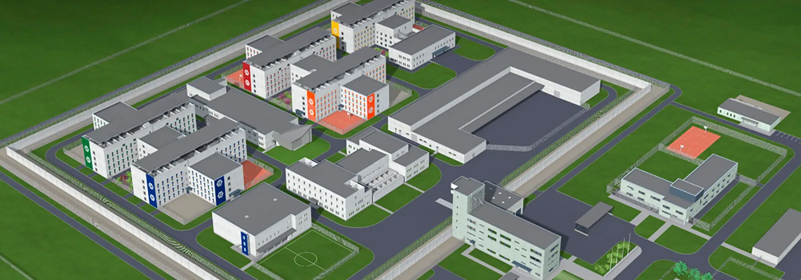 3D model of Tallinn’s prison complex with color-coded buildings, perimeter wall, roads, and open areas like courtyards and sports fields