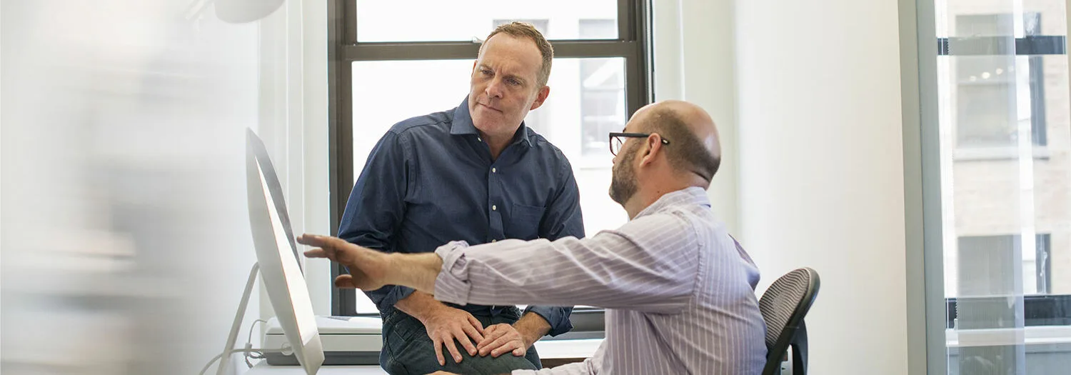 Two engineers in an engineering office
