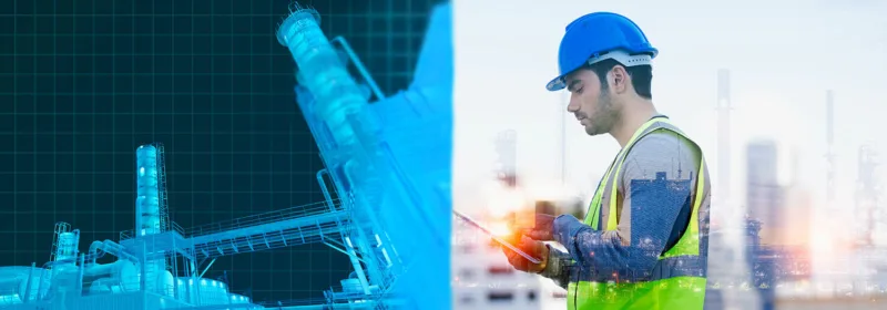 Engineer with a helmet looking at a tablet and a digital twin 3D model