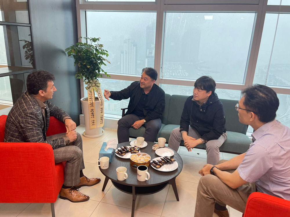 Men in the Cadmatic office