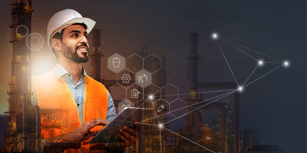 Engineer with a helmet, plant background, and digitalization