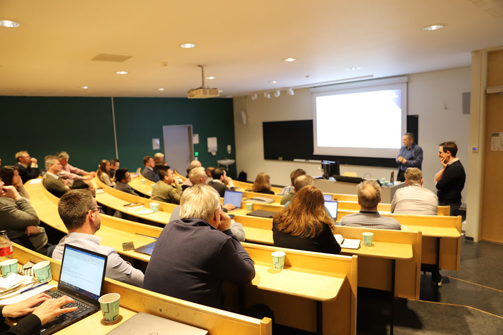 the SEUS team members listening speaker