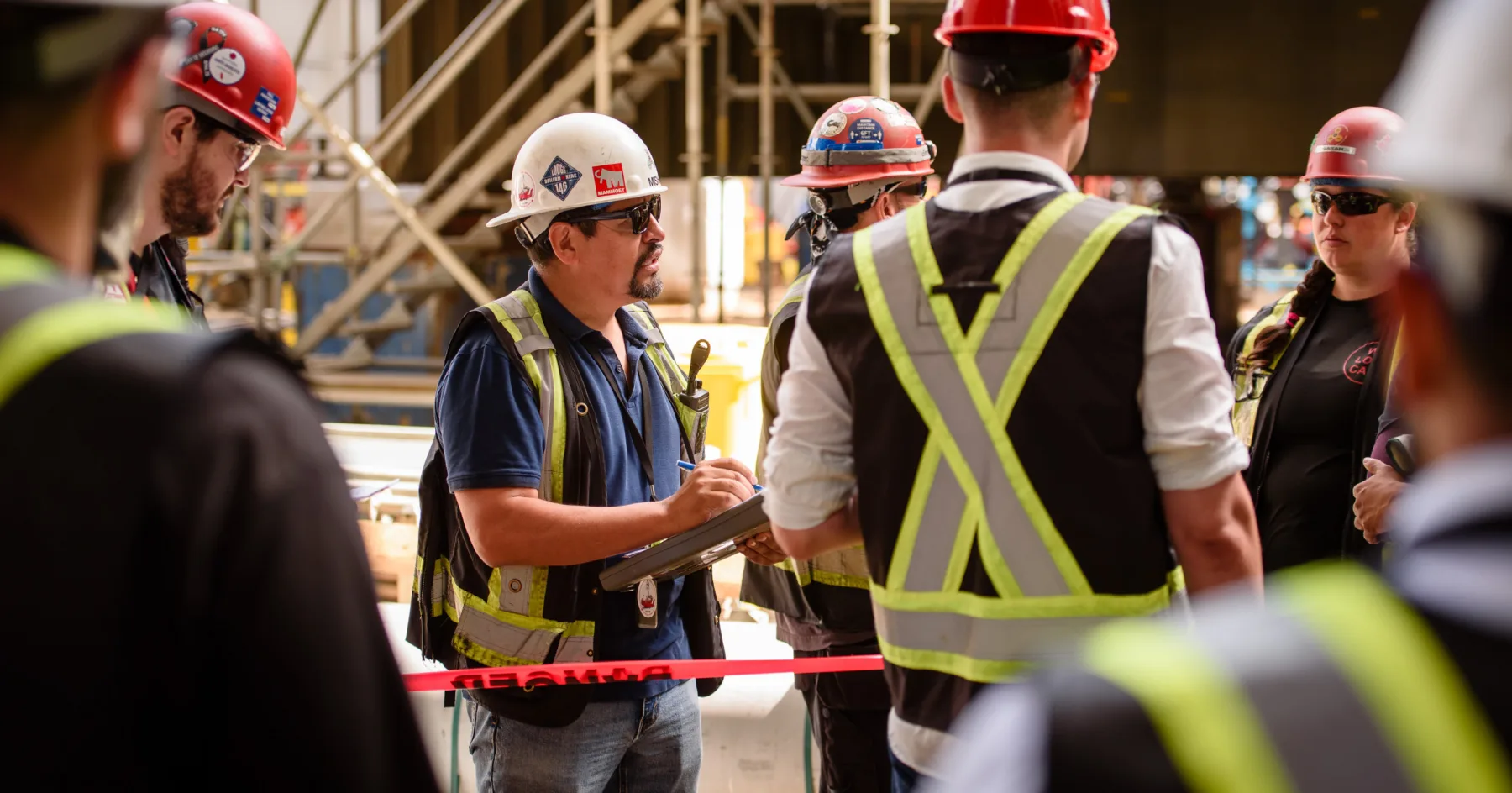 Seaspan workers collaborating on-site, supported by automated assembly planning processes